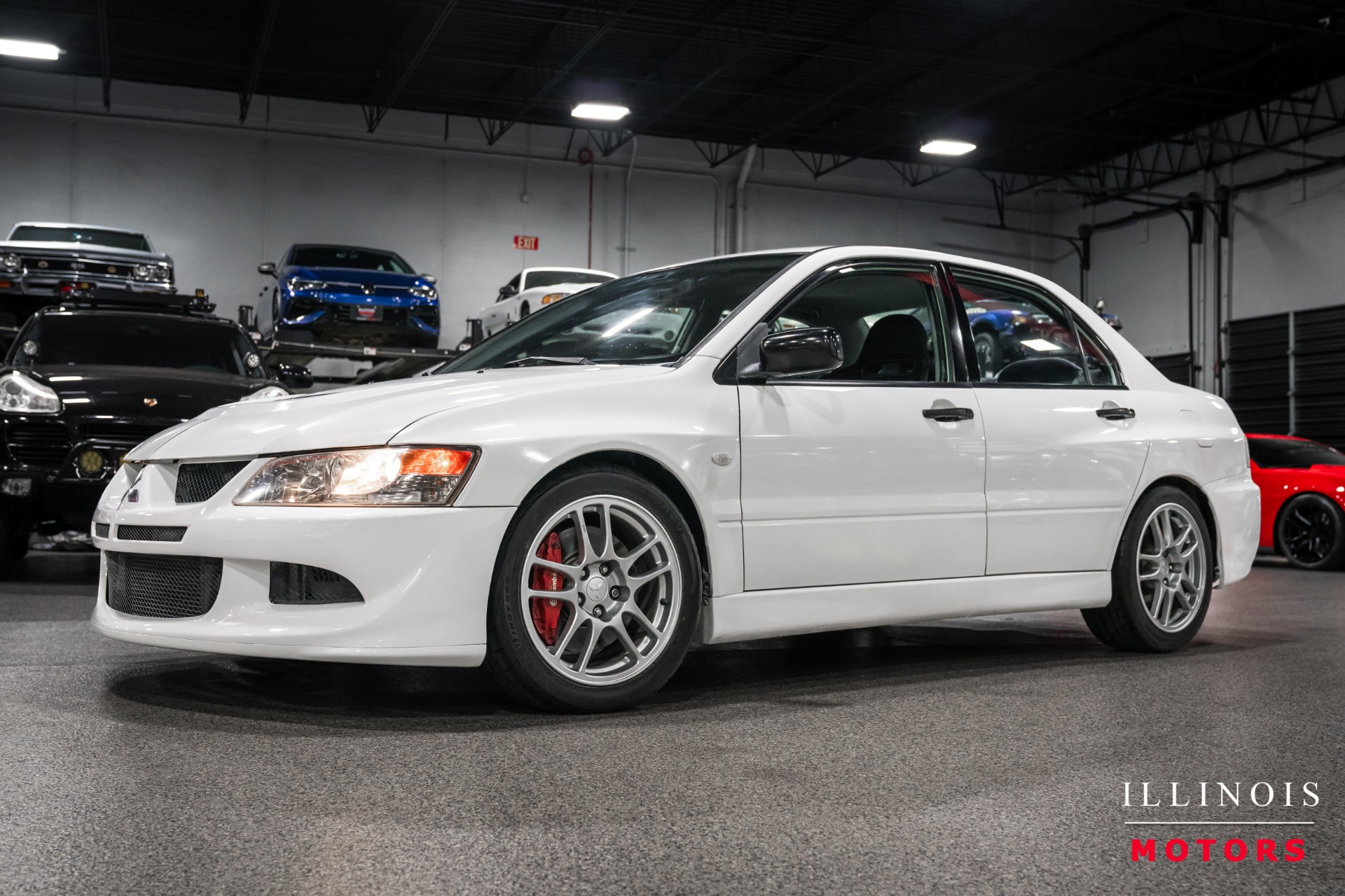 Weightless White 2004 Mitsubishi Lancer Evolution Sedan All-Wheel Drive 5-Speed Manual